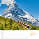 Gornergratbahn vor Matterhorn. Kalender für September 2027, 37. Woche. Berglandschaft mit Zug und schneebedecktem Gipfel.