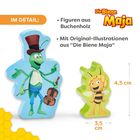 Texte: "IM DETAIL:", "Figuren aus Buchenholz", "Mit Original-Illustrationen aus 'Die Biene Maja'". Zu sehen sind zwei Figuren: ein grüner Grashüpfer mit Geige und eine Biene.