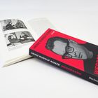Buchcover: "Heinz Rudolf Kunze Werdegang Die Autobiographie", daneben ein geöffnetes Buch mit Schwarz-Weiß-Fotos.