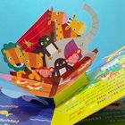 Bunte Pop-up-Illustration mit Tieren: Löwe, Giraffe, Elefant, Pinguin, Affe; Buchseiten mit Text in lebhaften Farben.