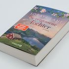 Text: "Soraya Lane, Die vergessene Tochter, SPIEGEL Bestseller-Autorin." Roman mit Hütten- und Seenlandschaft.