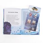 "Auf eiskalter Fährte" beginnt den Text. Eine Illustration zeigt einen lila Löwen auf schneebedecktem Boden. Ein Flyer preist Eldrador Creatures an.