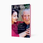 Auf einem Buchcover steht: "Lily Brett", „Lachen durchdringt den Schmerz“ Über Deutschland. Es zeigt zwei lächelnde Personen.