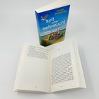 Ein Roman mit dem Titel "Sylt oder Sehnsucht" von Claudia Thesenfitz. Im Hintergrund ist ein geöffnetes Buch.