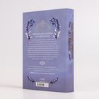 Zwischen zwei Männern und zwei Mächten. Ein Buchrücken zeigt "Empire of Burning Shadows" von Maxime Jensbord.