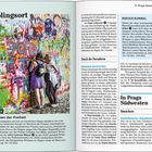 Texte: "YOFO", "Lieblingsort", "Die Farben der Freiheit", "John-Lennon-Mauer", "In Prags Südwesten". Zwei Personen bemalen eine bunte Wand.