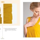 Nähanleitung mit gelben Blusenteilen und Frau in gelbem Oberteil. Oben rechts Text "BER" mit Flugzeugsymbol.