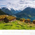 "Mai" und Kalendertage unten. Grashütten und ein See in einer Berglandschaft.