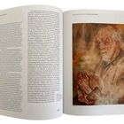 Links und rechts jeweils Text. Rechts Illustration eines alten Mannes mit gefalteten Händen. Seitenzahlen 102 und 103.