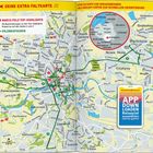 Stadtkarte mit gelber Überschrift „Deine Extra Faltkarte“, Karte von Krakau mit Sehenswürdigkeiten und App-Download-Hinweis.