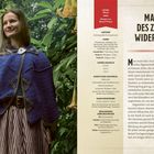 "Mantel des Zauberwiderstands. Level: Mittel. Design von Sharon Posey. Größe: Einheitsgröße für Erwachsene." 

Rechte Seite Textbeschreibung, linke Seite eine Frau im blauen Cape im Grünen.