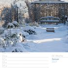 Kalender mit Daten vom 11. bis 17. Januar 2027. Foto eines verschneiten Rosengartens mit einer Laube und Bank.