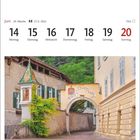 Juni, Woche 24, 14. bis 20. Montag bis Sonntag. Ansitz Löwengang in Margreid an der Weinstraße. Torbogen zwischen Gebäuden.