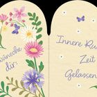 "Ich wünsche dir: Innere Ruhe, Zeit für dich, Gelassenheit." Illustration mit farbenfrohen Blumen und Schmetterlingen.