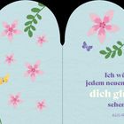 „Ich wünsche jedem neuen Tag, dass er dich glücklich sehen mag. Aus Irland.“ Blumen und Schmetterlinge auf hellblauem Hintergrund.