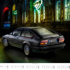 Text: "Hard Rock Café", "GTV 2.5", "SB-256KB". Schwarzes Auto vor beleuchtetem Gebäude, Kalender unten: Mai 2023.