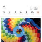 „Juli KW 27“, Kalendertage 5 bis 11, Bild zeigt bunten Heißluftballon von innen nach oben.