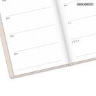 Die Seiten eines Kalenders sind mit Wochentagen beschriftet: Montag, Dienstag, Mittwoch, Donnerstag, Samstag, Sonntag.