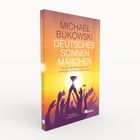 Text: "Michael Bukowski, Deutsches Sonnenmärchen. Wie wir die Solarenergie zum weltweiten Erfolg gemacht haben."  
Cover mit jubelnden Menschen und Pokal.