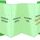 Eine grüne Klappkarte mit der Aufschrift: "Von guten Mächten wunderbar geborgen erwarten wir getrost was kommen mag."