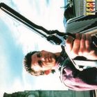 Text: "CYNTHIA ROTHROCK", "FACE DES TERRORS". Eine Person hält in dramatischer Pose eine Waffe, ein Turm im Hintergrund.