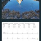 November-Kalender mit Wochentagen in mehreren Sprachen. Bild: Berglandschaft mit Matterhorn und Spiegelung im See.