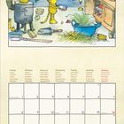 Ein Kalenderblatt für November 2027 zeigt eine Illustration mit einem Tiger und einem Schwein in einem gemütlichen Raum.