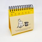 Ein Tischkalender zeigt die Woche vom 18. bis 24. Oktober. Darunter eine Zitatillustration mit einem Mumin-Charakter.