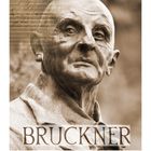 „BRUCKNER“ und „6“ sind prominent. Eine Statue eines Mannes, hinterlegt mit handgeschriebener Musiknotenschrift.