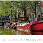 "Lastkahn", "LOVERS canal cruises", Juni-Kalenderblatt. Boote auf einem kanal, Bäume, Brücke, und holländische Architektur.