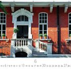 "Westminster" über einer Fassade aus roten Ziegelsteinen mit weißen Fensterrahmen und einer schwarzen Tür.