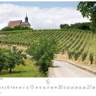 „Volkach, Maria im Weingarten“ zeigt eine Kirche auf einem Hügel, umgeben von Weinbergen, mit einem Weg im Vordergrund.