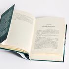 Offenes Buch, rechts der Text: "25. Dezember, Die erste Rauhnacht". Links eine geöffnete Seite mit Text.