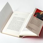 Text auf der rechten Seite: "Annette Mingels" mit einer Beschreibung der Autorin. Gezeigt wird ein offenes Buch, Titel "Hjördis".