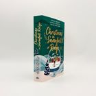 "Christmas in Snowfall Ridge" von Tonia Krüger, Leonie Lastella, Valentina Fast. Illustration von Häusern in einer Schneekugel.