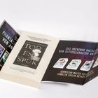 Texte: "Die phantastischen", "Spiiegel Bestseller", "Das packende Rache-Quartett", "Kommissar Walter Pulaski und Anwältin Evelyn Meyers ermitteln". Ein Buch liegt offen, umgeben von mehreren Büchern.