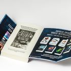 Ein aufgeschlagenes Buch von Andreas Gruber. Titel: "Die letzte Fahrt der Enora Time". Weitere Bestseller abgebildet.