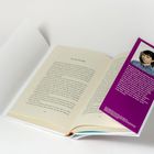 Ein aufgeschlagenes Buch mit einem lila Lesezeichen, das Text über eine Münchnerin, Nina Sonnenberg, enthält.