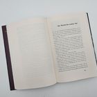 „Der Recherche zweiter Teil“ steht am Anfang einer Buchseite. Seite 101. Das Buch liegt offen auf einem hellen Untergrund.