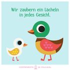 Oben steht "Wir zaubern ein Lächeln in jedes Gesicht." Darunter eine bunte Illustration von zwei stilisierten Enten.