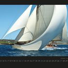 Kalenderseite mit der Zahl 6. Darunter eine Segelyacht mit großen, weißen Segeln auf dem Meer.