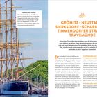 Grömitz–Travemünde Radtour Infos, Bild eines großen Segelschiffs "Passat", voller bunter Flaggen, am Hafen.