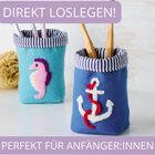 "DIREKT LOSLEGEN! PERFEKT FÜR ANFÄNGER:INNEN" auf zwei Filzbehältern; einer mit Seepferdchen, der andere mit Anker-Motiv.