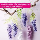 "Bastelideen für jede Jahreszeit und jeden Anlass" in einem pinken Banner. Dekoration aus Papierblüten an Zweigen.
