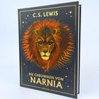 C.S. LEWIS, DIE CHRONIKEN VON NARNIA, uebereuter. Ein Löwenkopf in leuchtenden Farben mit Sternen verziert.