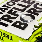 "Tatort Trelleborg" in großen schwarzen Buchstaben, grüne Schrift: "Gunni Hilding ermittelt", Waldbild im Hintergrund.