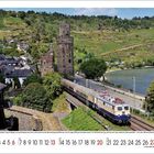 Kalender: Monat Juni, Tage 1 bis 30. Zugfahrt durch eine grüne Landschaft, nahe einem alten Turm und Fluss.