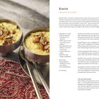 Rezept für "Kheer - Cremiger Milchreis". Zutaten: Milchreis, Cashewkerne, Sultaninen, Safran, Kardamom, Zucker. Gericht in Schalen.