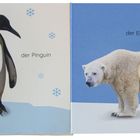 Links steht "der Pinguin", rechts "der Eisbär". Pinguin und Eisbär mit Flausch-Stellen, Schneeflocken dekorativ.