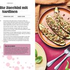 Gefüllte Zucchini mit Sardinen Rezept, Zutaten und Zubereitung, Bild zeigt gefüllte Zucchini auf einem Teller.